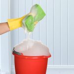 How to clean a vinyl fence with a bucket of soap and water