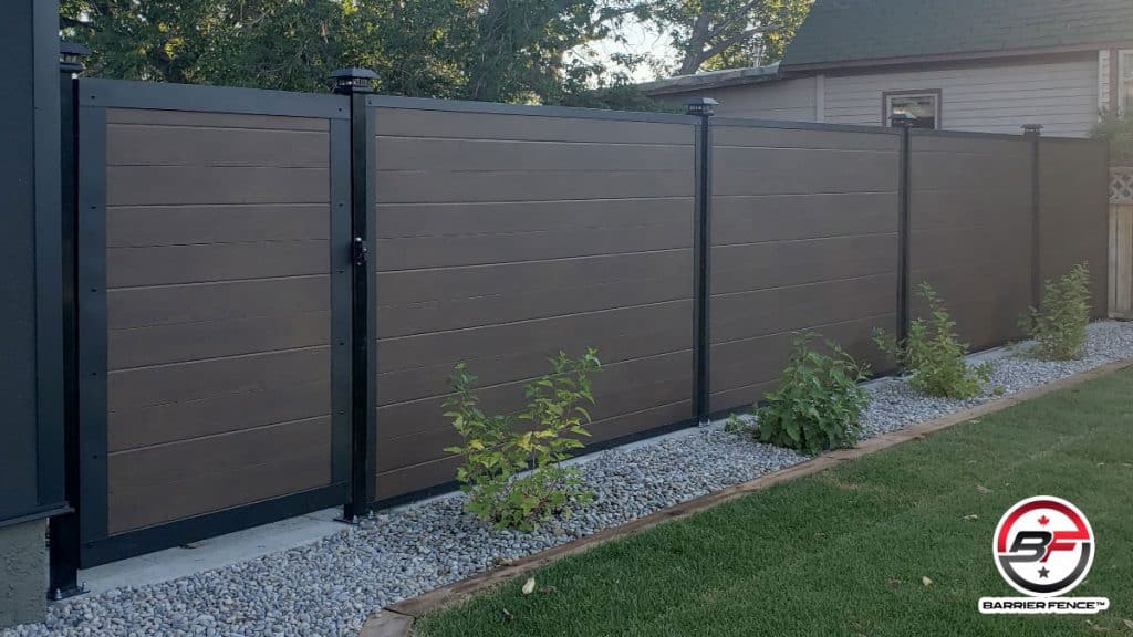 Barrier sound fence walnut colour installed Canada