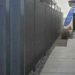 Barrier fence black sound barrier system installed along highway Canada